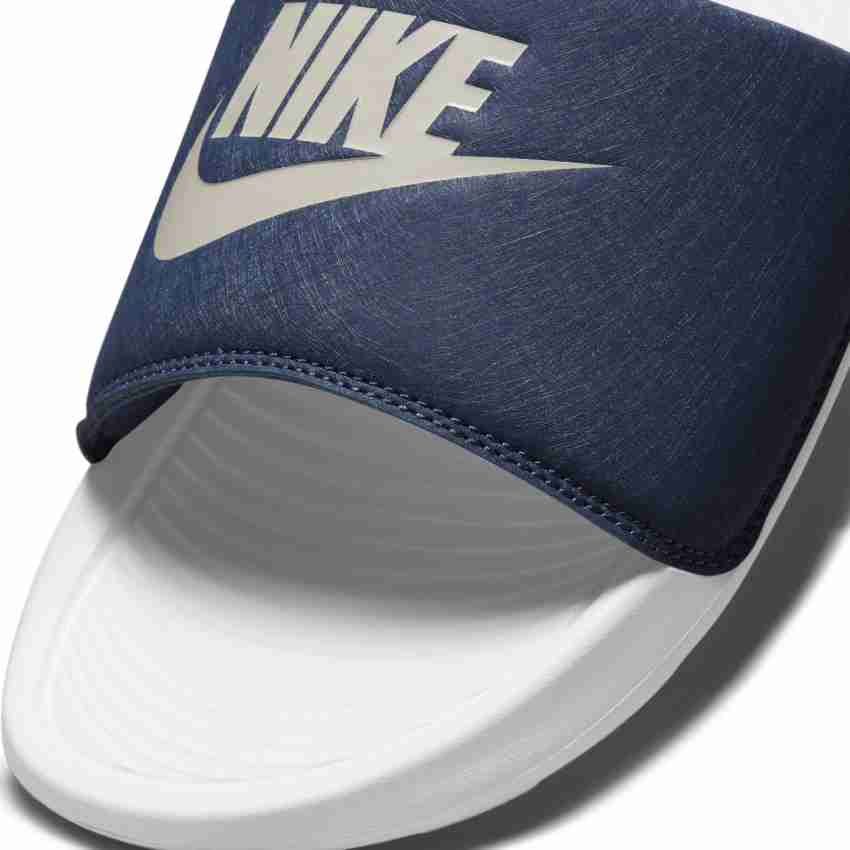 Blue and white online nike slides