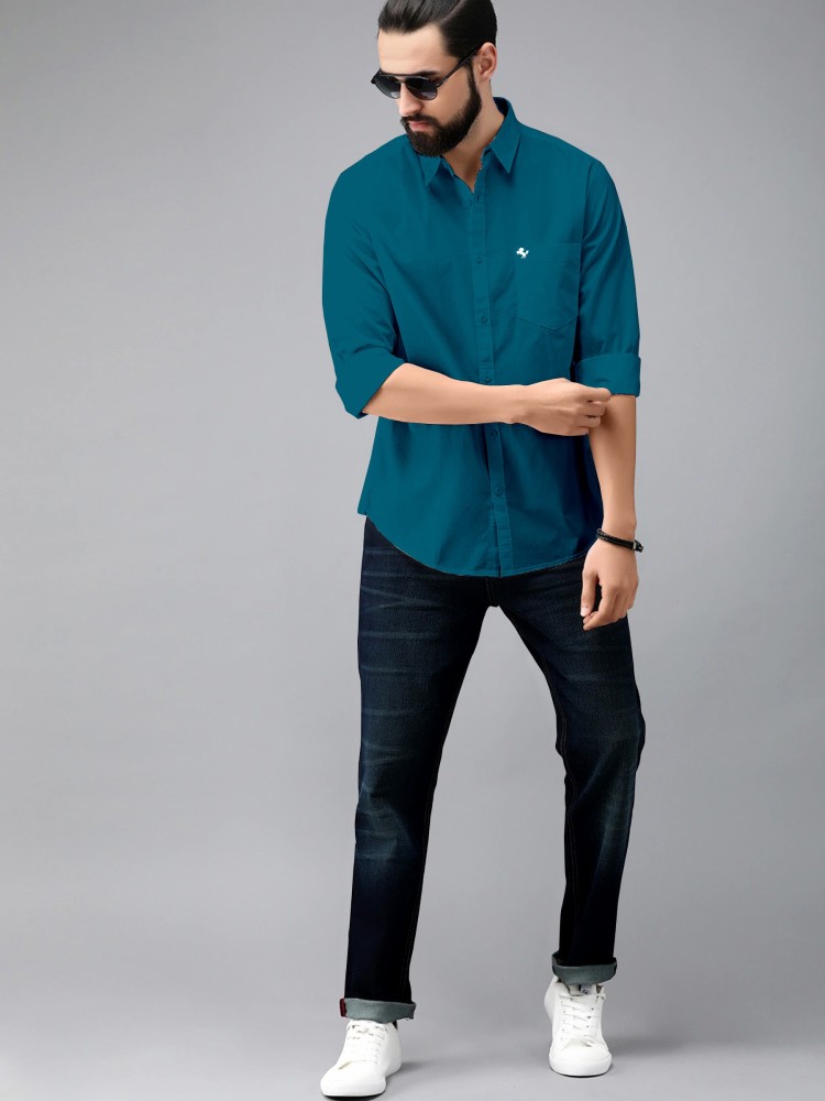 dark firozi colour shirt