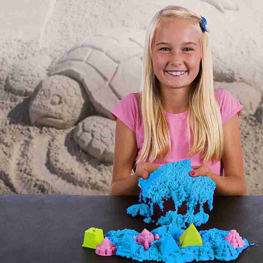 Premium Photo  The layout of childrens kinetic sand and molds for  sculpting in the form of a frame kids development