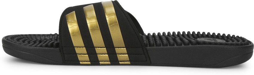 Adidas black 2024 gold slides