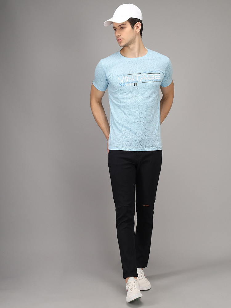 Light blue t shirt black jeans top