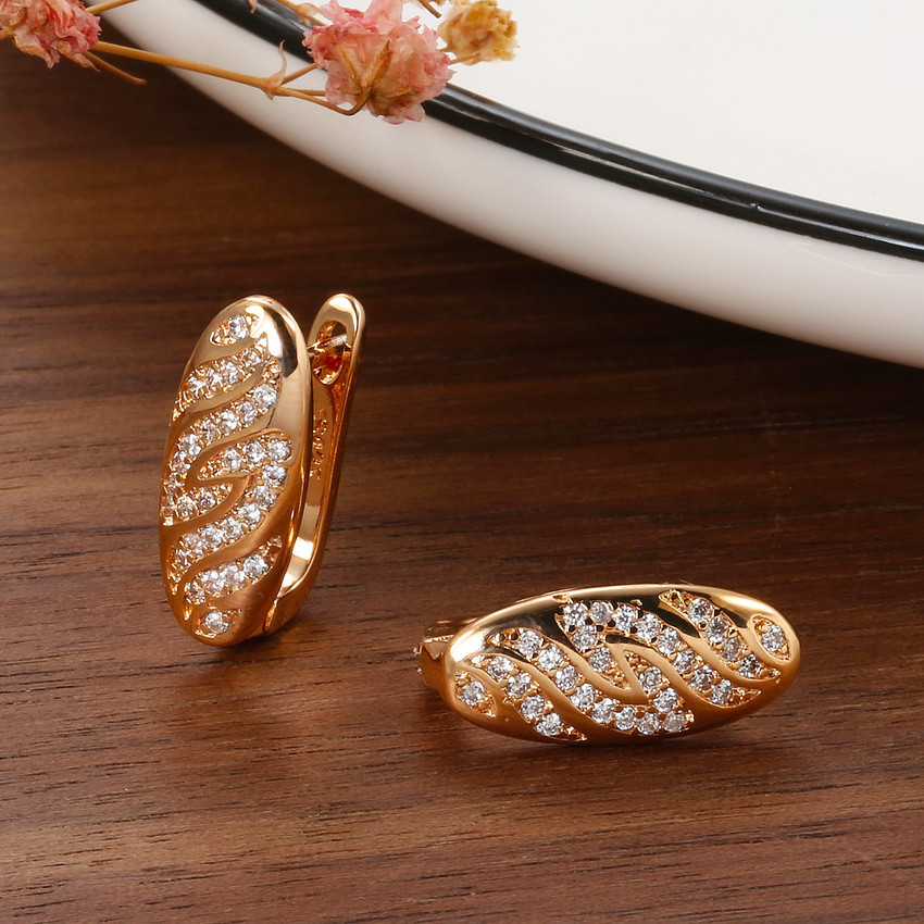 Details 158+ flower design gold earrings seven.edu.vn