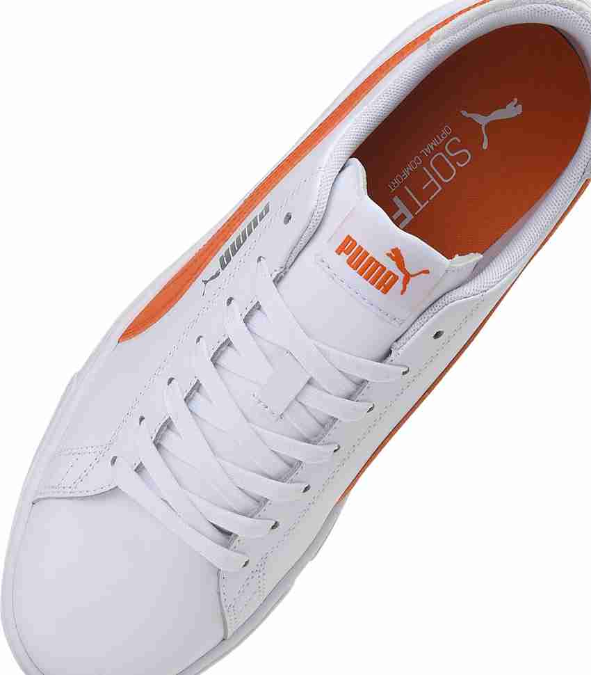 Orange pumas top