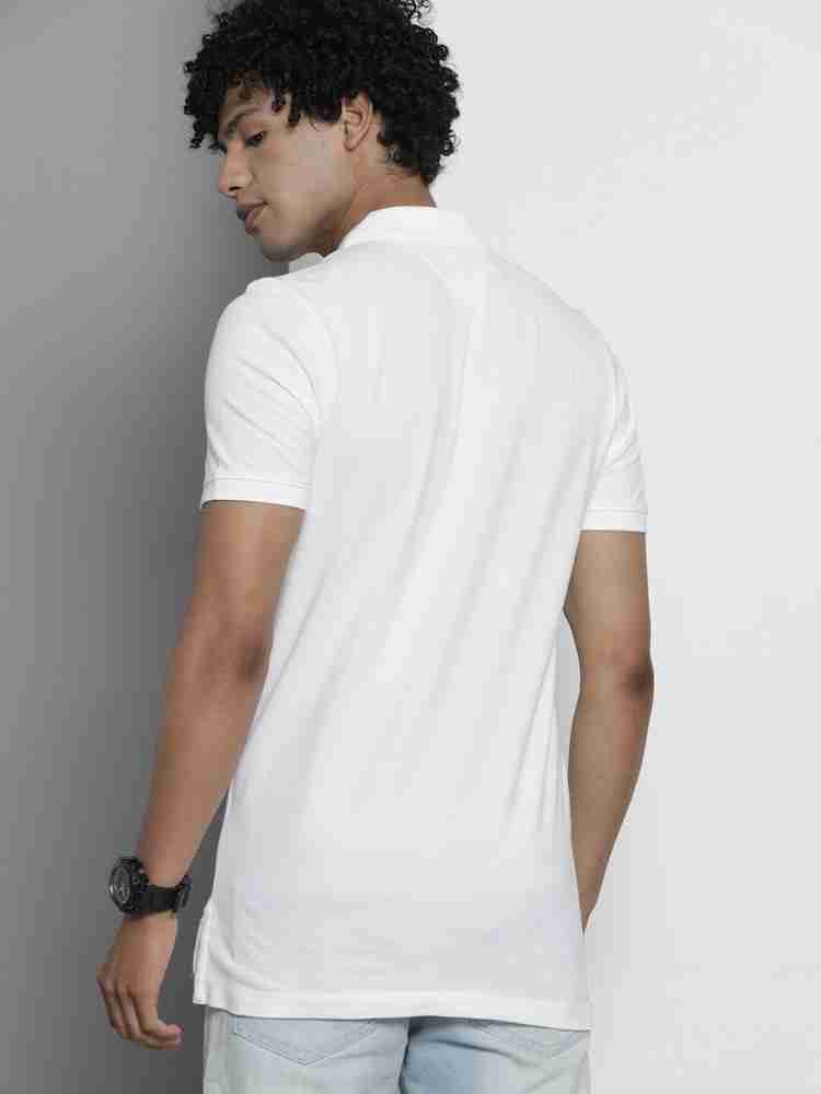 TOMMY HILFIGER Solid Men Polo Neck White T-Shirt - Buy TOMMY