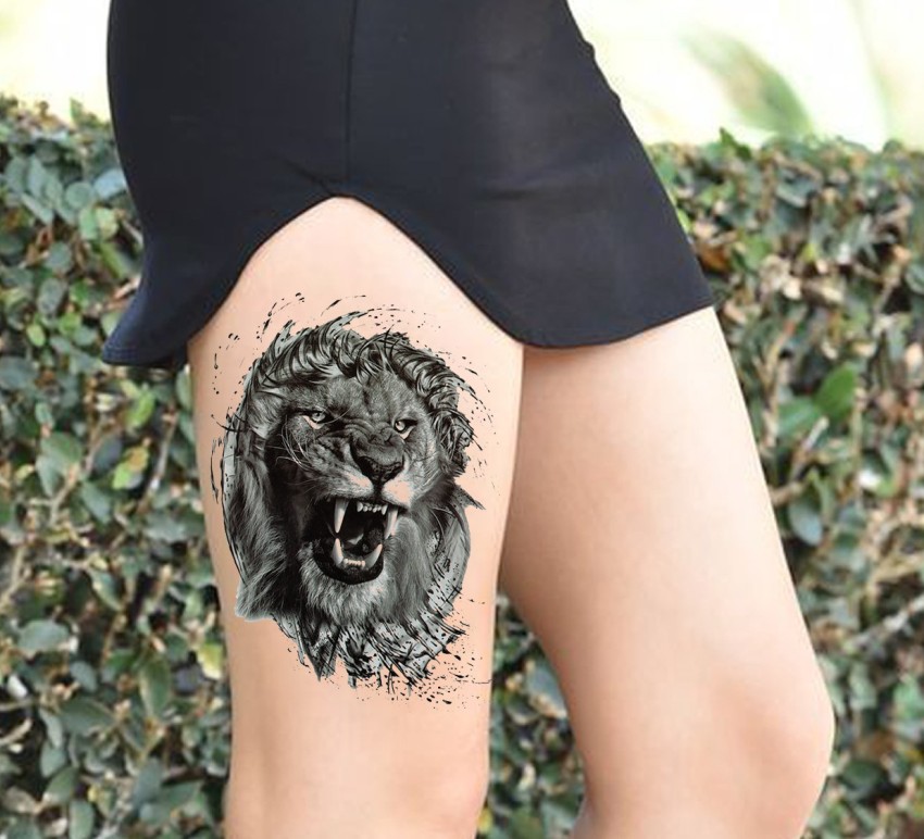 Premium Vector  Graphic hand drawn detailed lion head with open mouth and  sharp canines vector black and white tattoo or logo sketch
