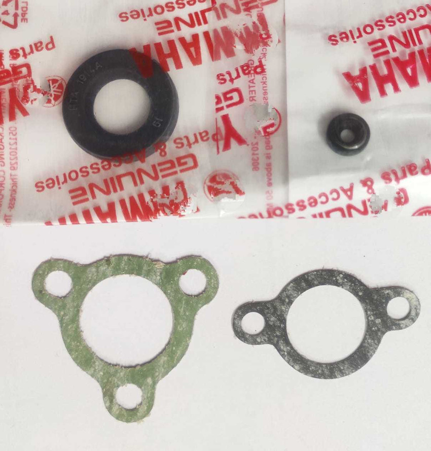 Yamaha rx 100 2t oil shop pump spare parts
