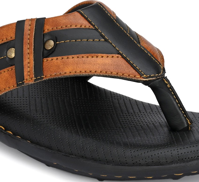 Tan flip flops with black online straps