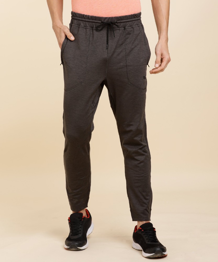 PUMA TRAIN CLOUDSPUN JOGGER Self Design Men Black Track Pants - Buy PUMA  TRAIN CLOUDSPUN JOGGER Self Design Men Black Track Pants Online at Best  Prices in India