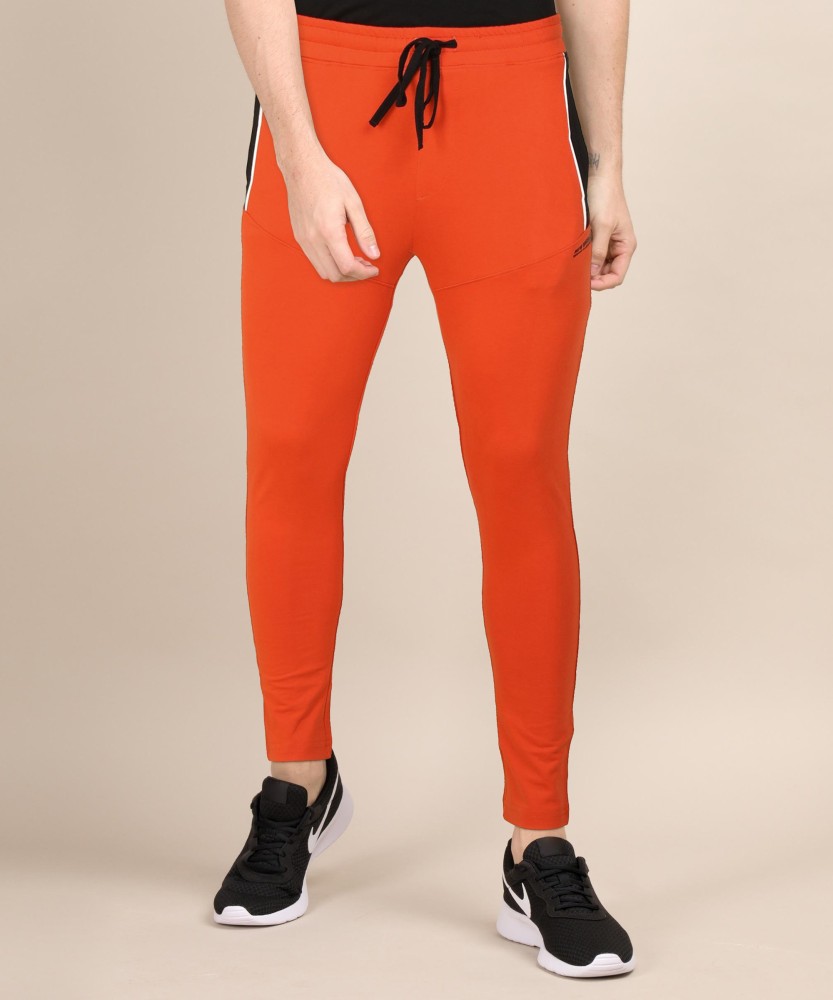 Orange track 2025 pants mens