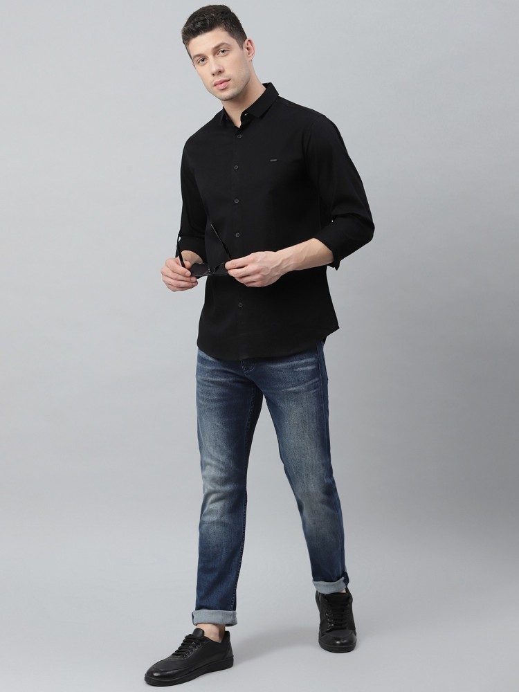 black shirt dark jeans