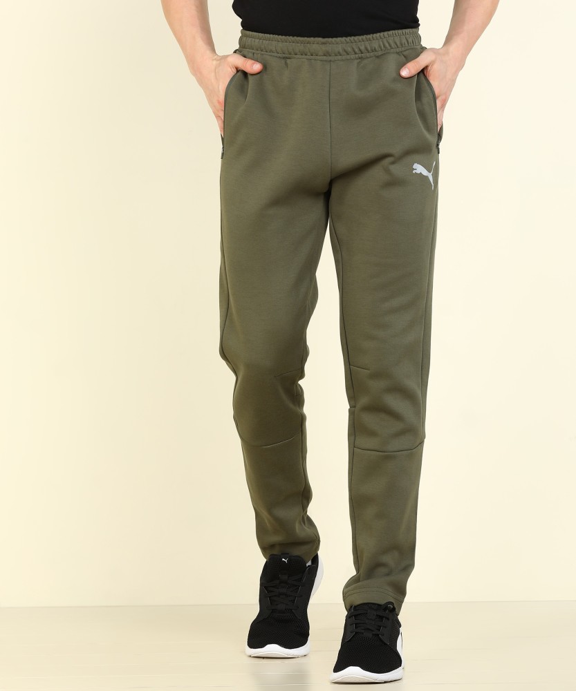 PUMA EVOSTRIPE Pants Solid Men Green Track Pants Buy PUMA