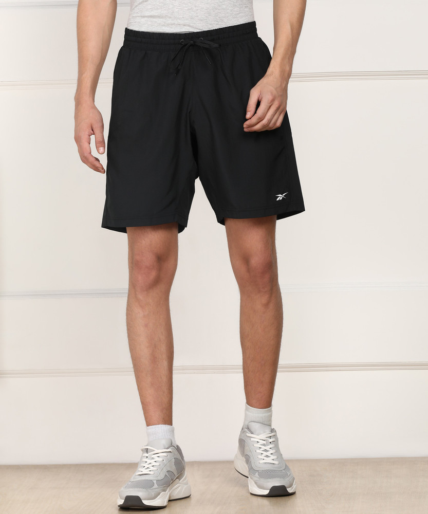 Bermudas reebok best sale