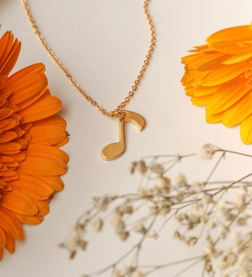 Gold necklace with music note hotsell
