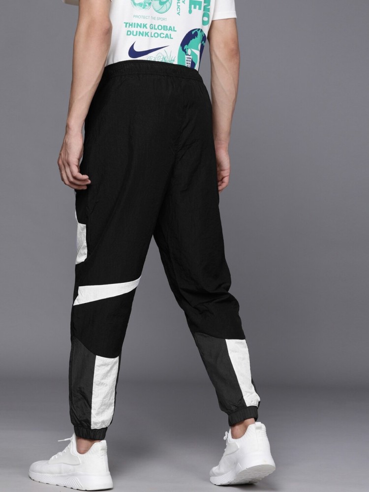 Nike big cheap swoosh track pants