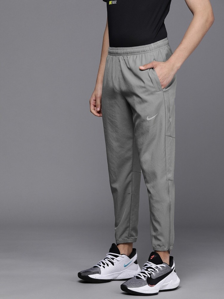 Nike woven track online pants grey