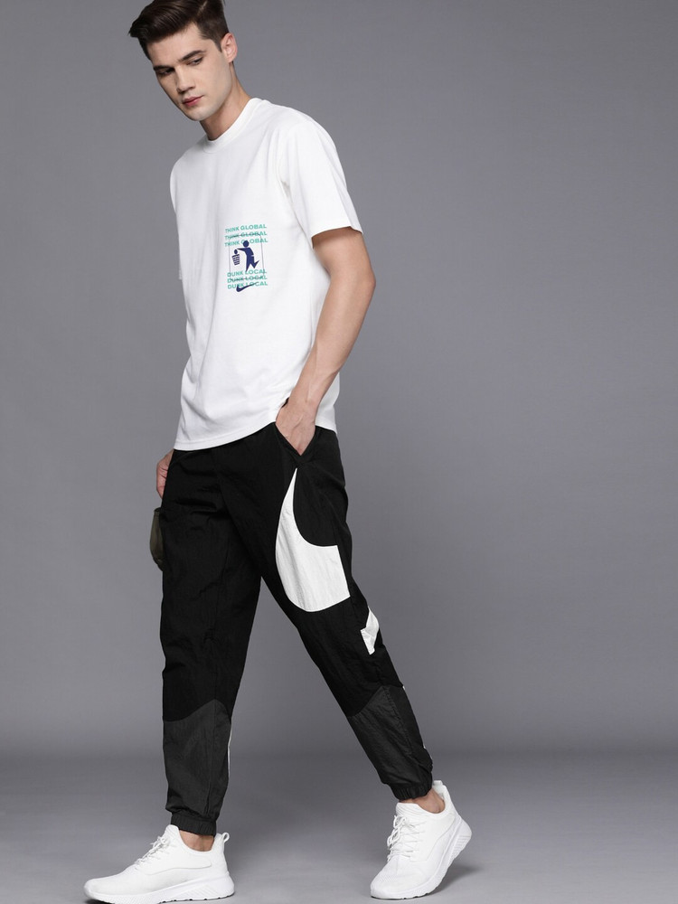 Nike big online logo pants