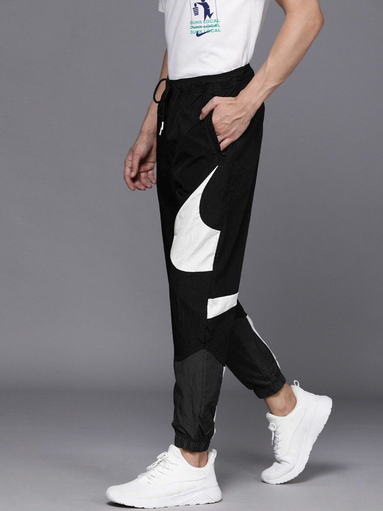 nike track pants big swoosh