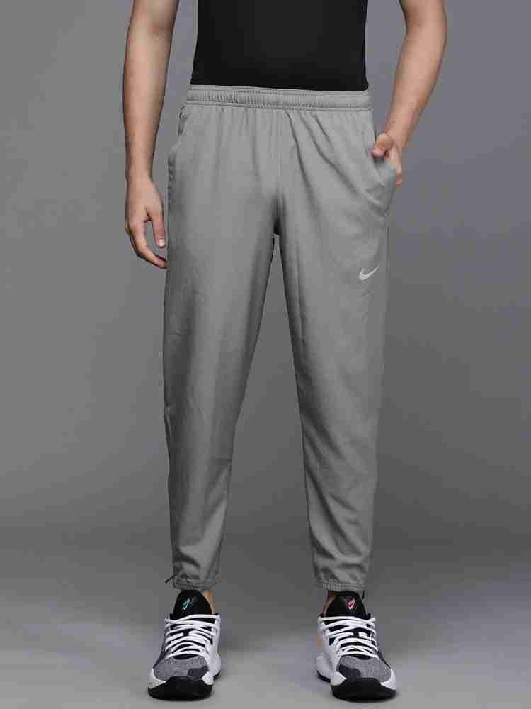 NIKE Solid Men Grey Track Pants Buy NIKE Solid Men Grey Track