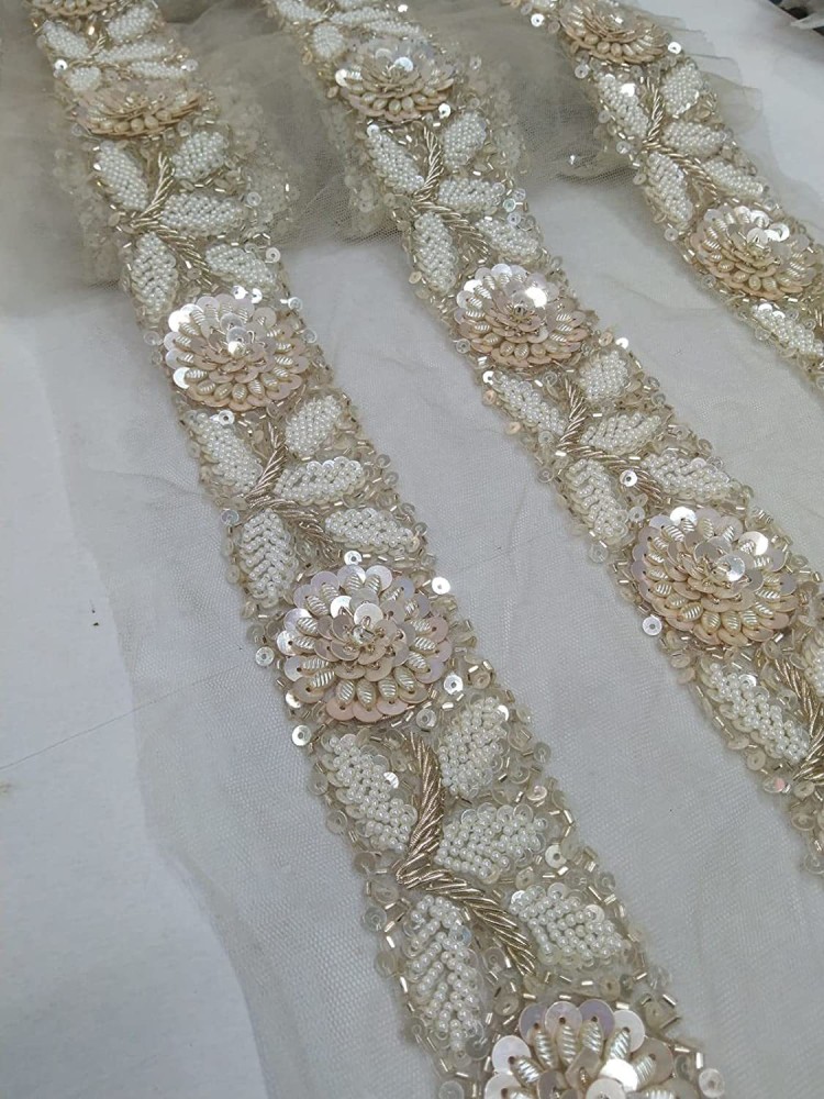 https://rukminim2.flixcart.com/image/850/1000/ktep2fk0/lace-reel/n/g/v/new-handwork-white-golden-lace-reel-with-heavy-beads-pearl-work-original-imag6rhqwtefz2ha.jpeg?q=90&crop=false