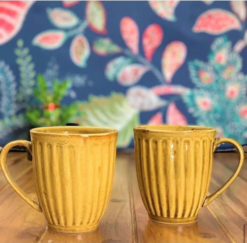 https://rukminim2.flixcart.com/image/850/1000/ktep2fk0/mug/e/l/2/ceramic-mug-set-of-2-medium-size-yellow-color-chai-coffee-juice-original-imag6rgcq7kppxgf.jpeg?q=90