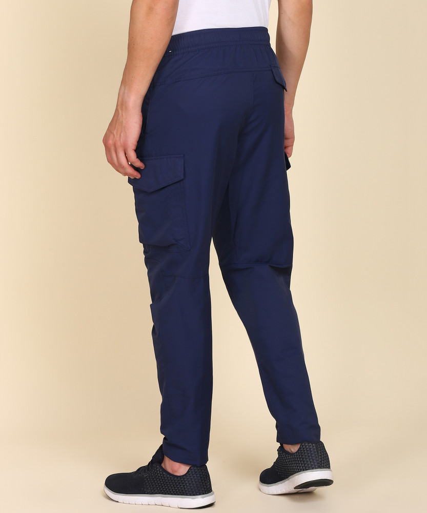 NIKE Solid Men Blue Track Pants Buy NIKE Solid Men Blue Track