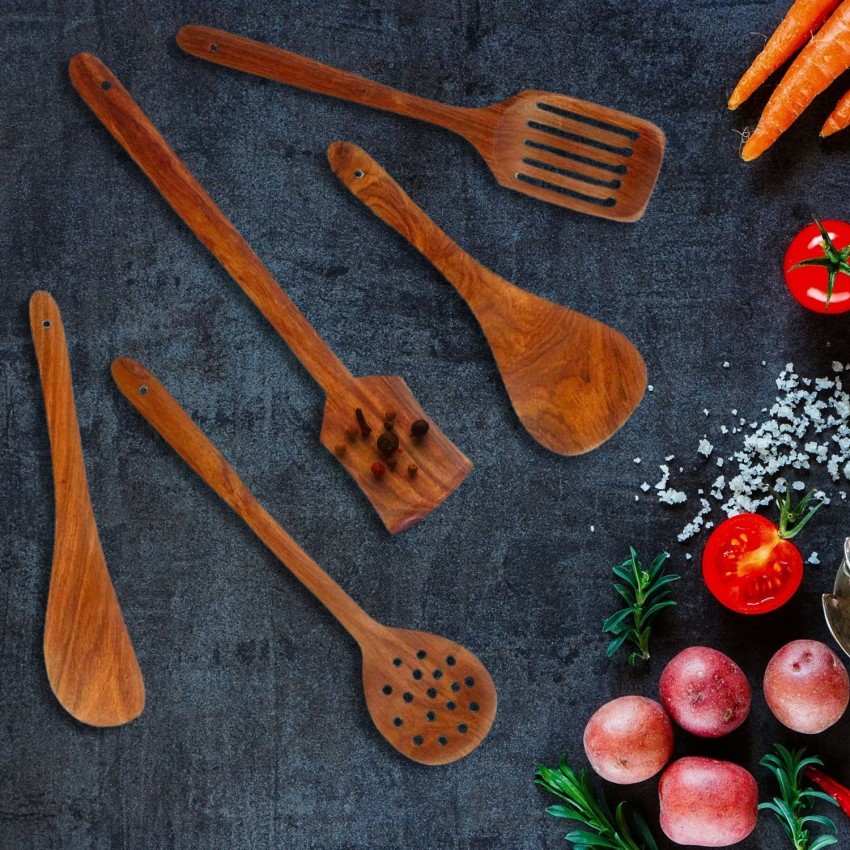 Wooden kitchen utensils on white background. Cutting board, fork