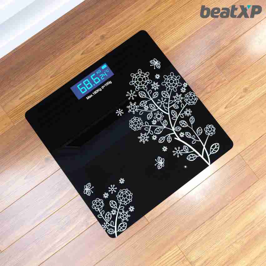 Premium Photo  Analog weight scale on wood floor