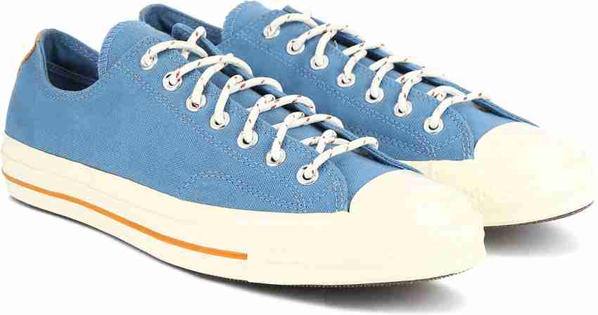 Are converse considered tennis shoes hot sale