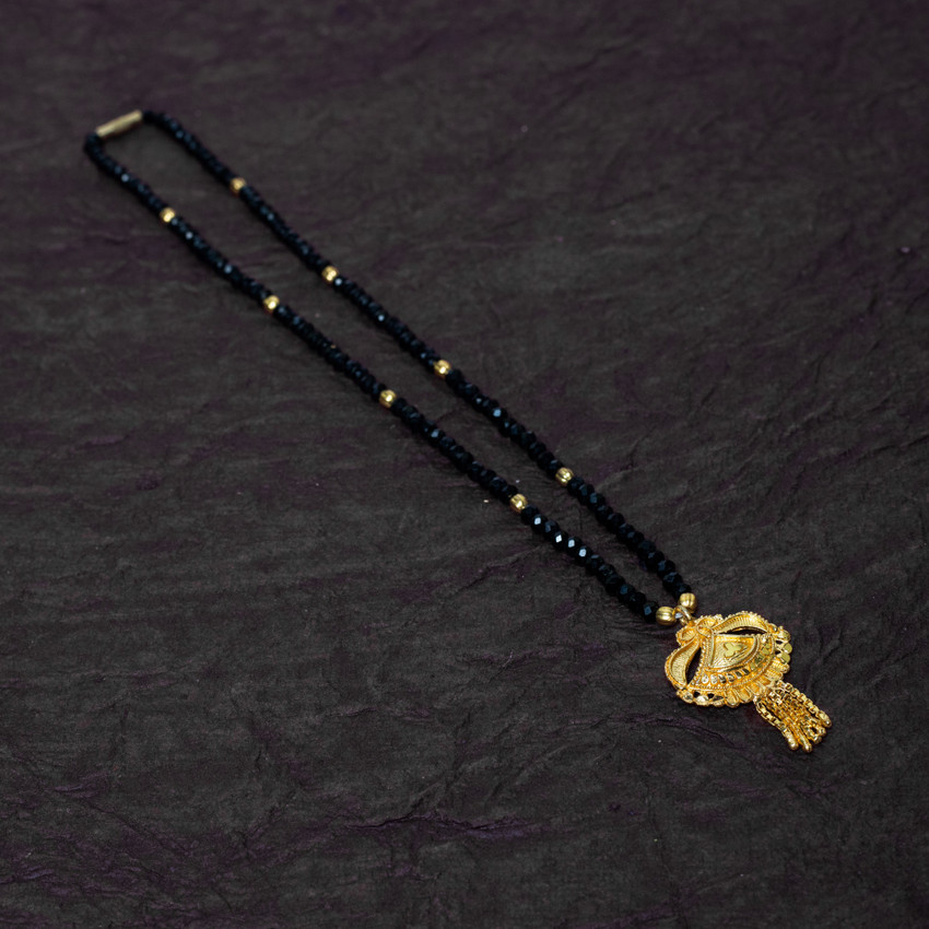 Ditya Gloria Women s Gold Plated With Black Moti Mangalsutra Only Brass Mangalsutra Price in India Buy Ditya Gloria Women s Gold Plated With Black Moti Mangalsutra Only Brass Mangalsutra Online