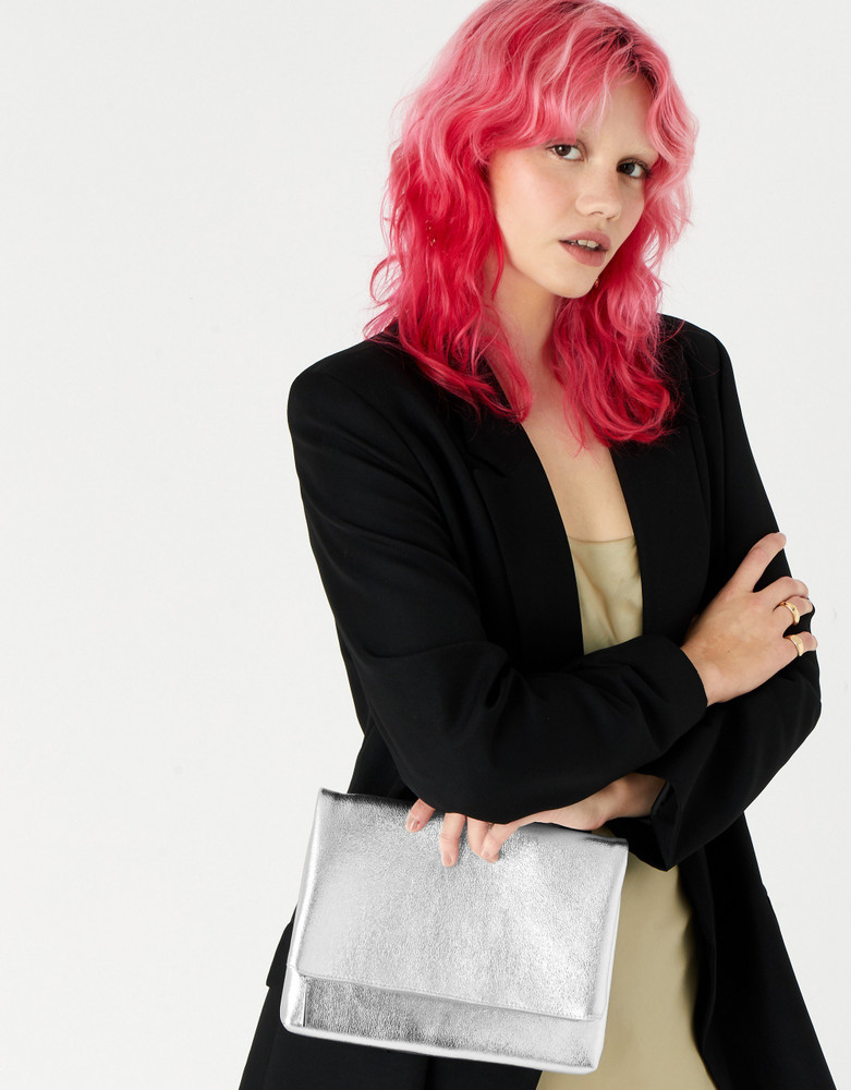 Accessorize silver clutch top