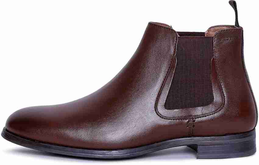 Red tape hot sale boots flipkart