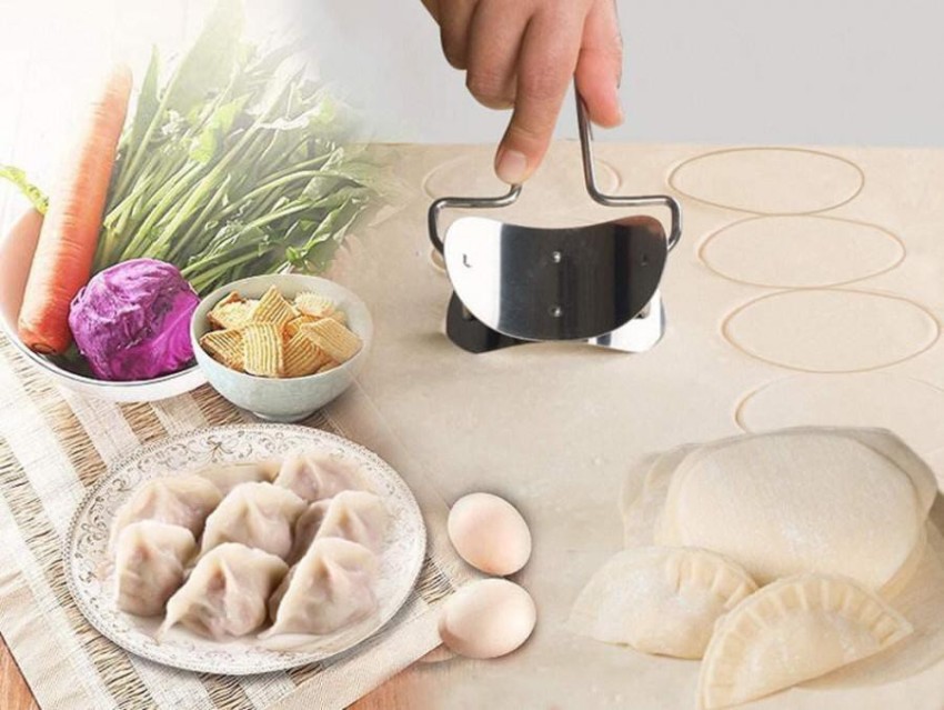 https://rukminim2.flixcart.com/image/850/1000/kura1e80/baking-cutter/0/b/7/1pc-puri-cutter-roller-machine-with-handle-stainless-steel-original-imag7sg4dgmggms8.jpeg?q=90