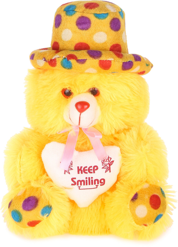 yellow teddy bear with cap