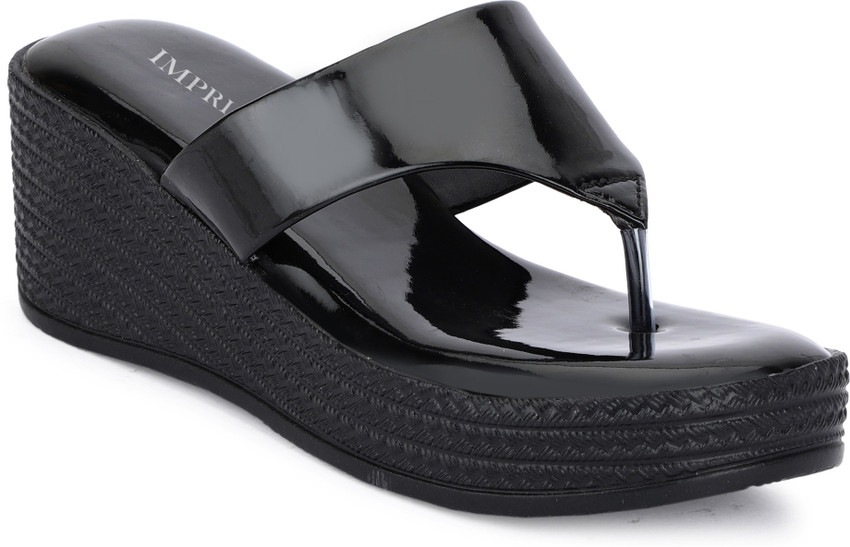 Black wedge online flip flops