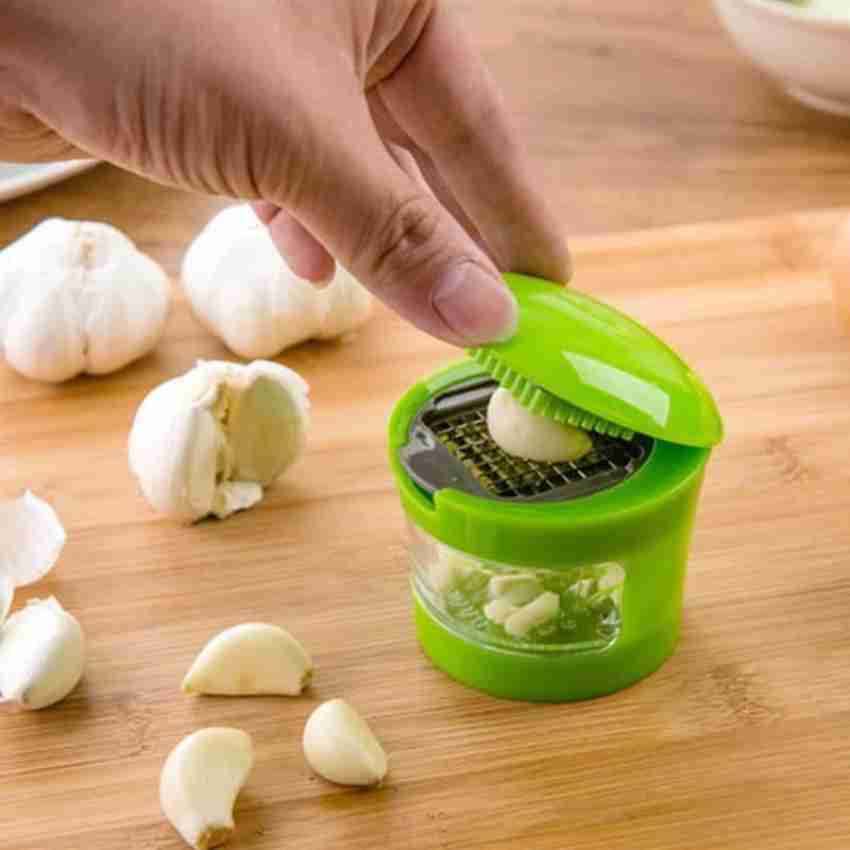 https://rukminim2.flixcart.com/image/850/1000/kwcfngw0/garlic-press/u/f/o/7-5-garlic-chopper-ginger-chopper-peeler-slicer-mincer-cutter-original-imag9fva5xazgu9v.jpeg?q=20