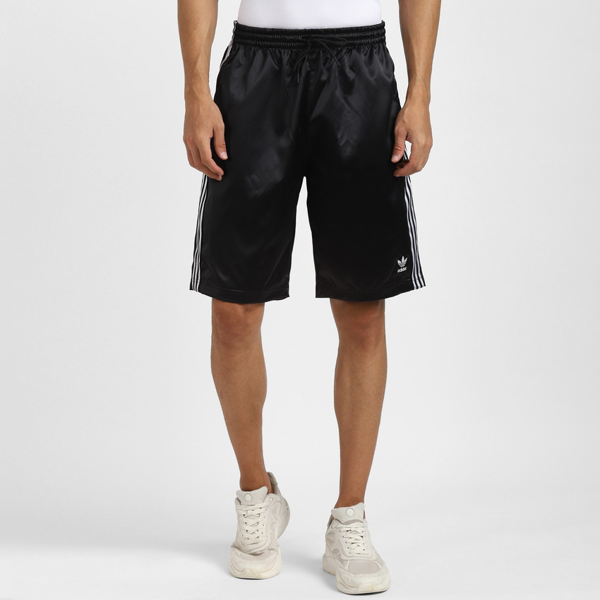 Pantaloncini sales adidas falsi
