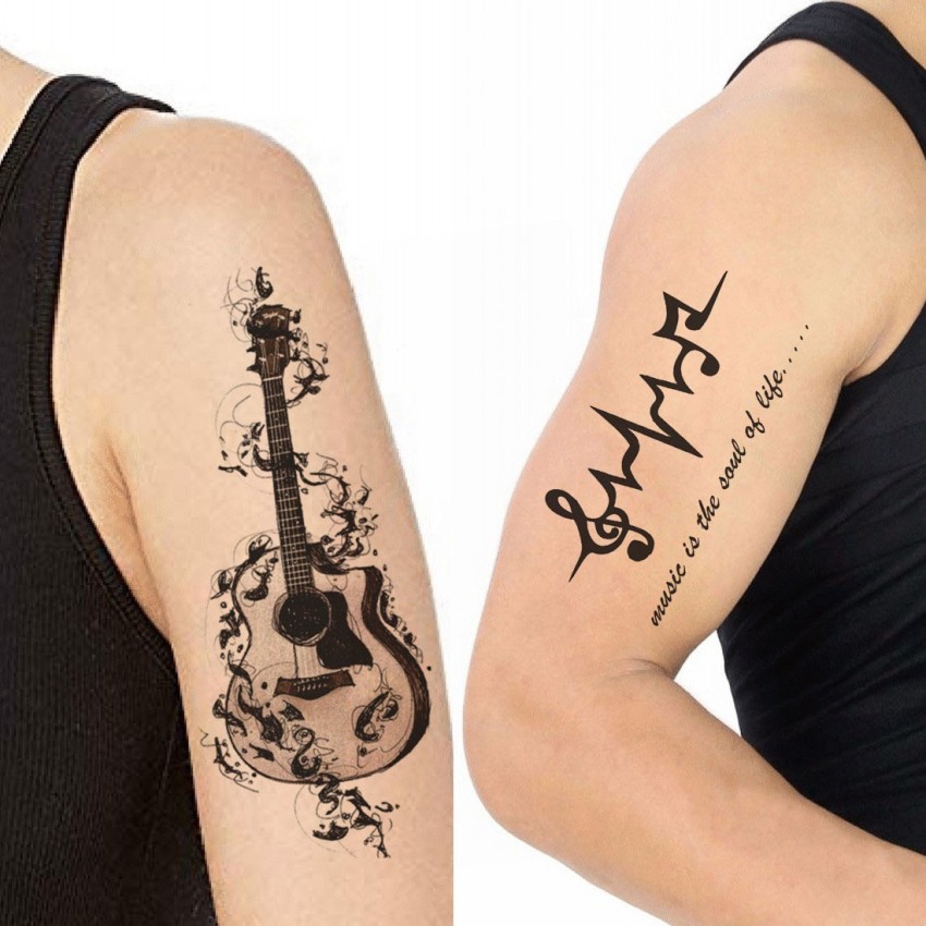 xăm đàn guitar tattoo guitar xăm hình phong cách watercolor hình xăm  đẹp xăm hình nghệ thuật tại tungtatto  Guitar tattoo design Music  tattoos Guitar tattoo