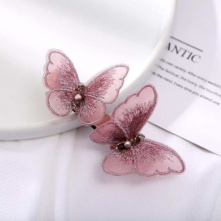 Pink butterfly hair clips store