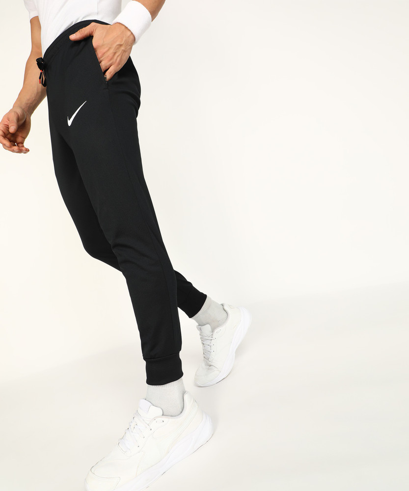 Nike dri fit shop tapered jogging bottoms