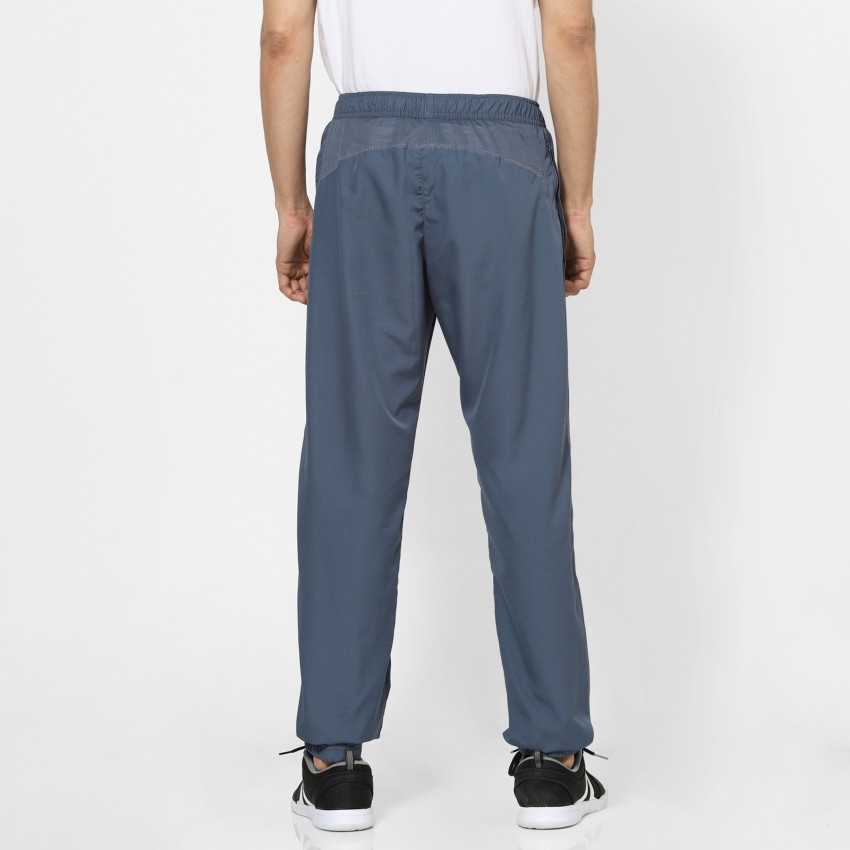 DOMYOS by Decathlon Solid Men Blue Track Pants - Buy DOMYOS by Decathlon Solid  Men Blue Track Pants Online at Best Prices in India
