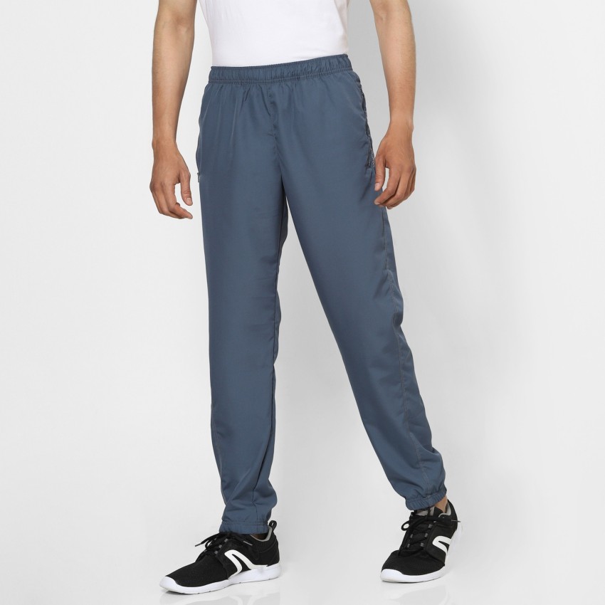 DOMYOS by Decathlon Solid Women Blue Track Pants - Buy Domyos Blue DOMYOS  by Decathlon Solid Women Blue Track Pants Online at Best Prices in India
