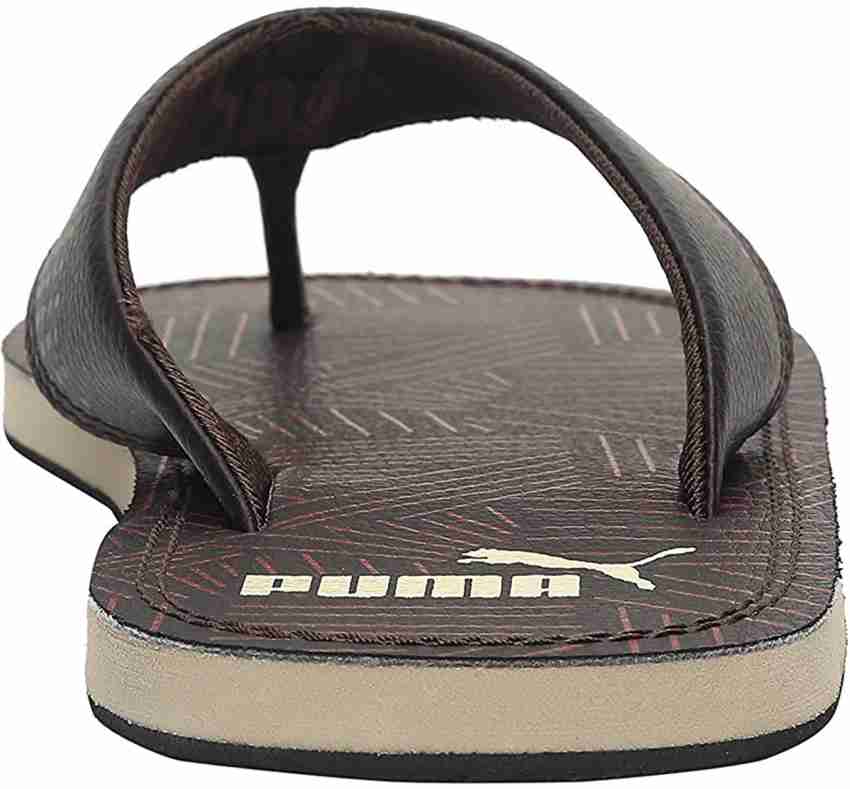 Puma brown outlet leather slippers