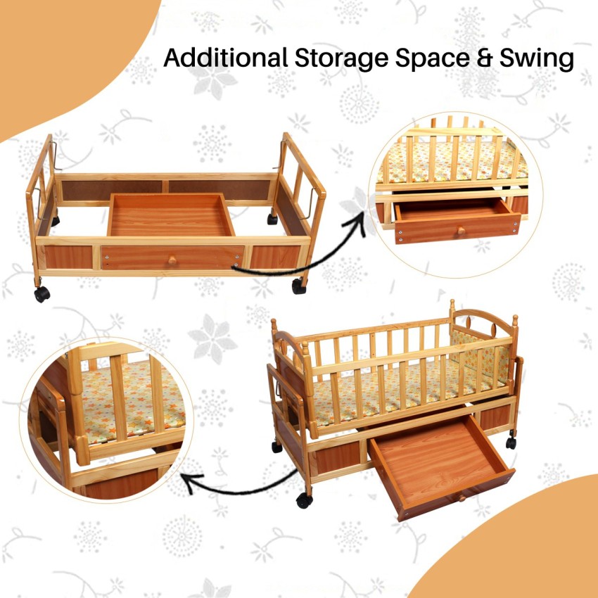 Baby wooden best sale cot with swing