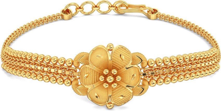 Joyalukkas  This bangle style gold bracelet has a  Facebook