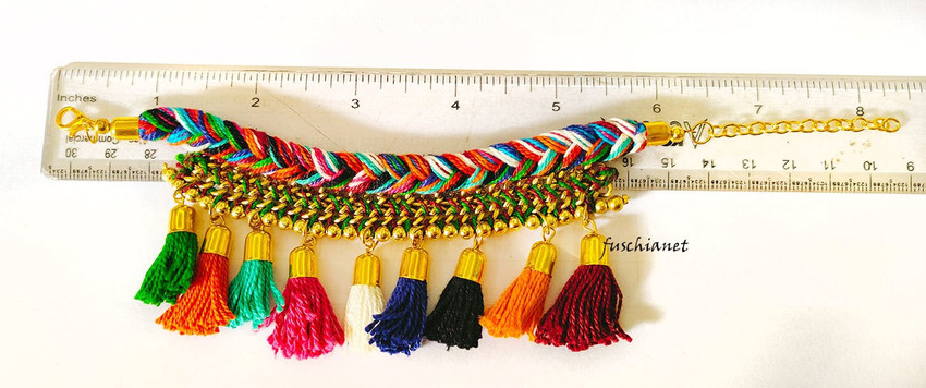Tassel bracelet discount in ms dhoni
