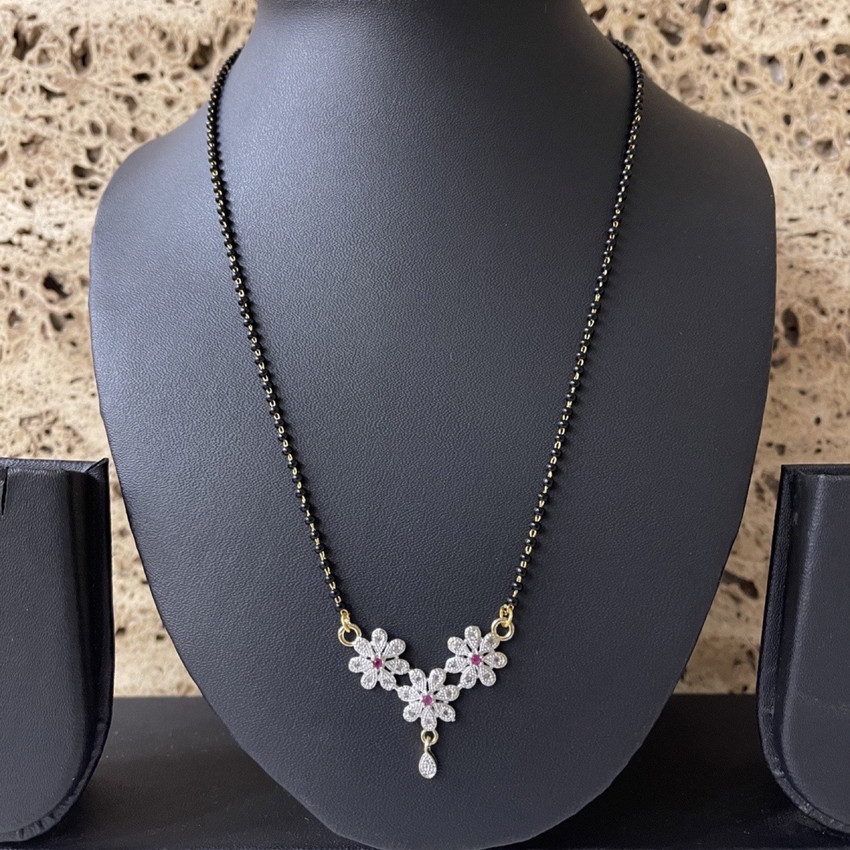 Digital Dress Room Short Mangalsutra Designs Gold Plated Flower Diamond Black Beads Chain Alloy Mangalsutra Price in India Buy Digital Dress Room Short Mangalsutra Designs Gold Plated Flower Diamond B...