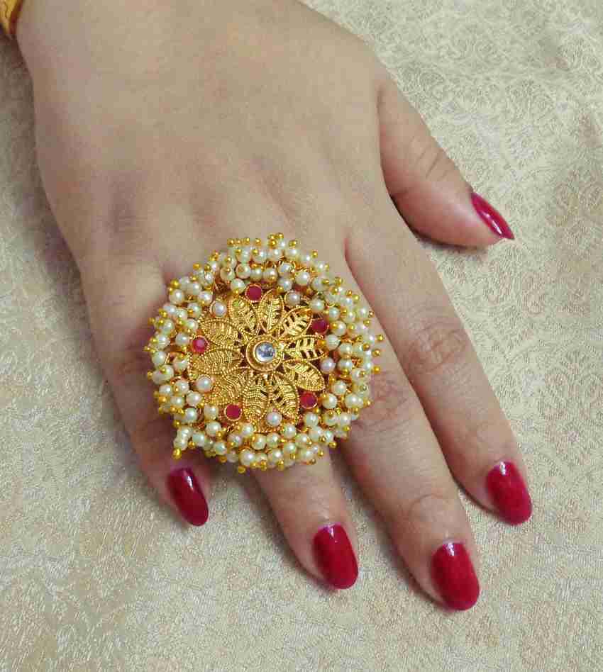 Gold big finger ring hotsell