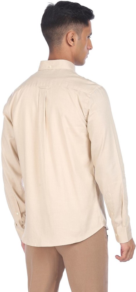 U.S. POLO ASSN. Men Solid Casual Beige Shirt - Buy U.S. POLO ASSN