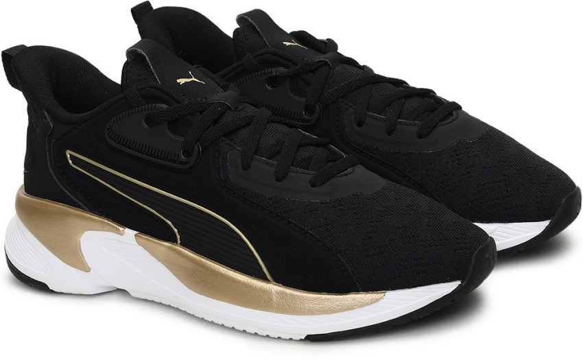 Puma noir et clearance doré