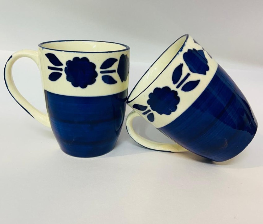 CERAMIC MUG WITH BLUE AND BLACK FLOWERS